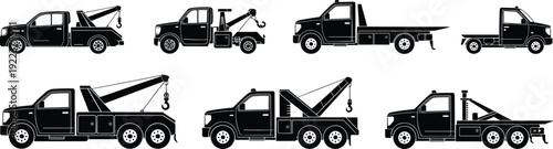 Set of black tow truck silhouettes, heavy-duty tow vehicles collection, recovery trucks vector, roadside assistance service icons illustration