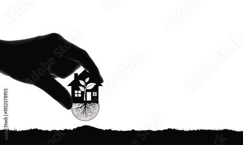 Human hand planting house icon with roots over soil and silver coin
