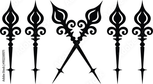 Five ornate black silhouette decorative finials and spearheads symmetrically displayed on a pristine white surface