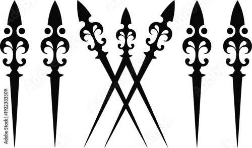 Seven black stylized ornate arrowheads with intricate details symmetrically presented on a white background