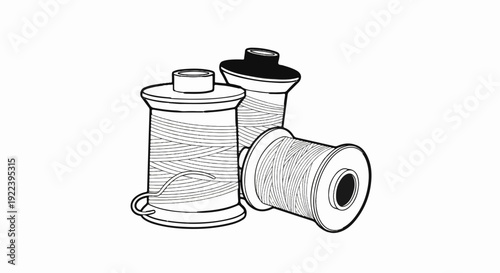 Three spools of thread arranged together, two upright and one on its side