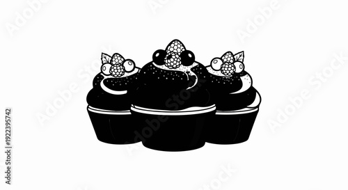 Three dark, frosted cupcakes topped with berries and leaves