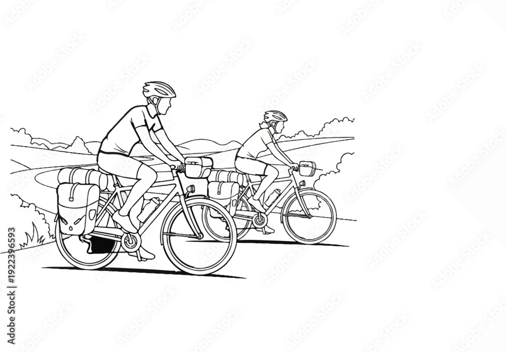 Fototapeta premium Two cyclists with loaded bikes ride along a scenic road in the countryside