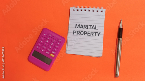 Obraz na plátne Legal document about marital property with calculator and pen on orange backgrou