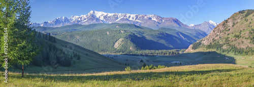 Bild auf Leinwand Picturesque mountain valley on a sunny summer morning, panoramic view