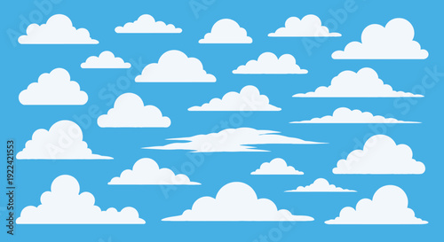 Collection of Fluffy White Clouds on a Clear Blue Sky Background