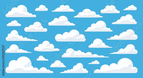 Collection of Fluffy White Clouds Floating in a Bright Blue Sky Background
