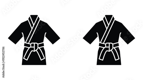 Two black karate kimonos with white belts