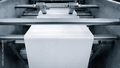Vászonkép A machine with a roll of polyethylene plastic film on it