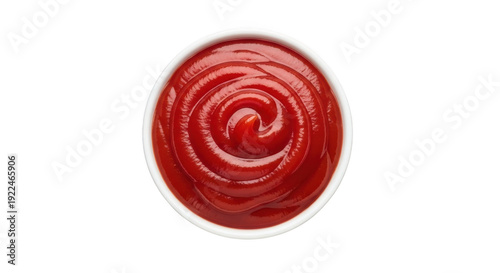 Top view of swirl pattern ketchup in a white bowl, a classic condiment