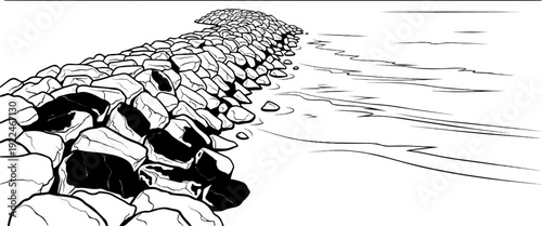 Stone breakwater extending into wavy water with rocks along the shore