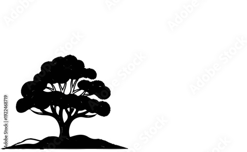 Silhouette of a stylized tree with spreading branches and textured ground