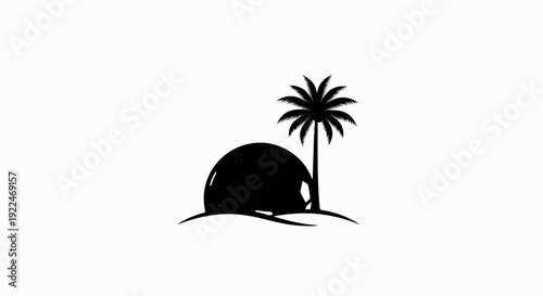 Silhouette of a tent and palm tree on a sandy dune at sunset