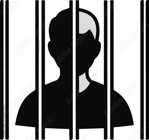Silhouette of person behind prison bars, partially shaded