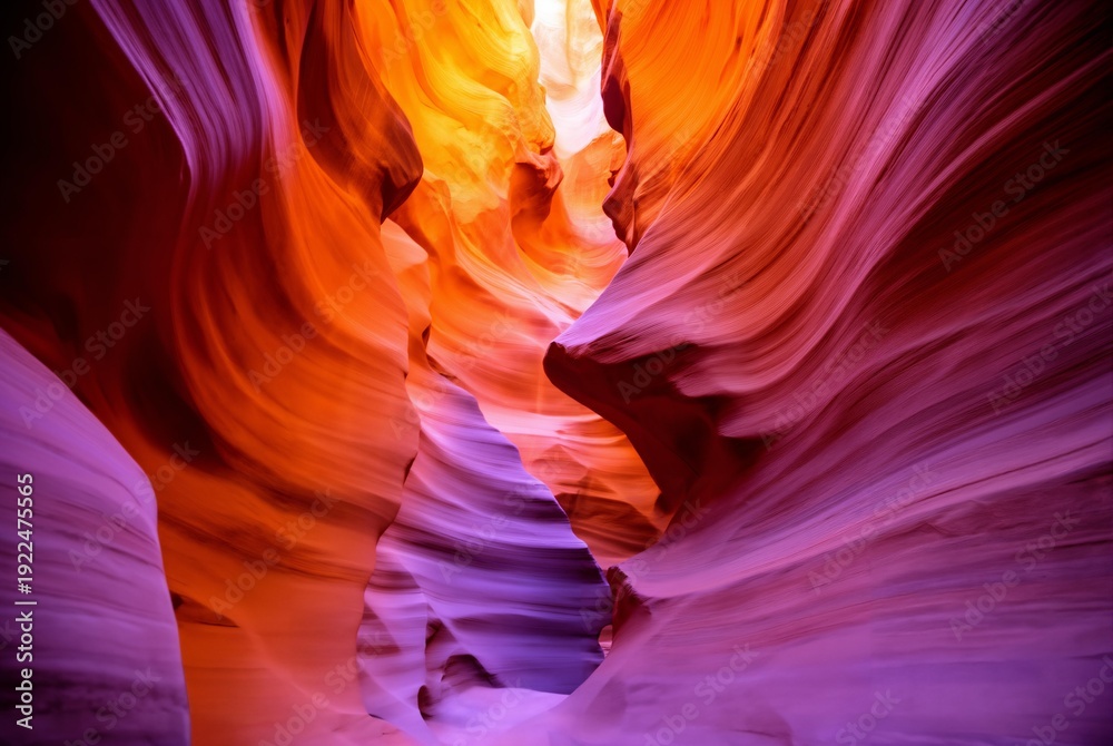 Obraz premium Dramatic canyon landscape with vibrant red rock formations and warm sunlight