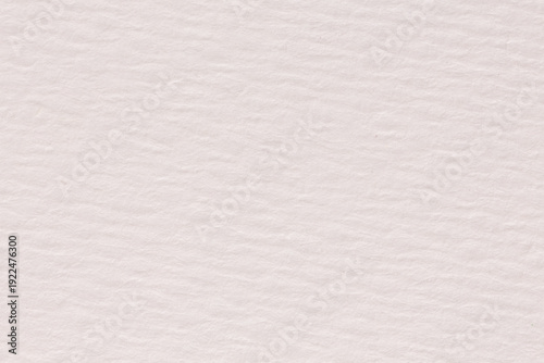 Light beige paper texture light rough textured spotted blank copy space background.