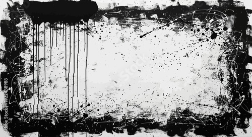 Ink splatters on a white canvas create an abstract artistic background from a frontal viewpoint