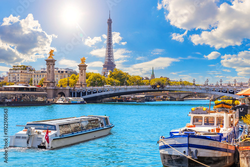 Alexandre III Bridge with Ships on the Seine River and Eiffel Tower behind, Paris, France