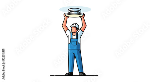 An electrician wearing a hard hat and blue overalls is holding a smoke detector above his head ready to install it.