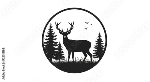 Black silhouette of a deer with antlers standing in a forest.