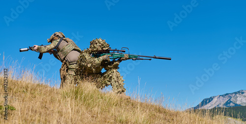 Fotografía Two Military Snipers in Camouflage Ghillie Suits and Tactical Gear Training With