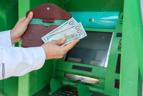 Female hands with wallet an...