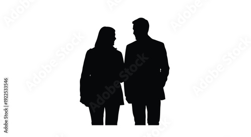 Silhouette of a couple standing close together against a plain white background