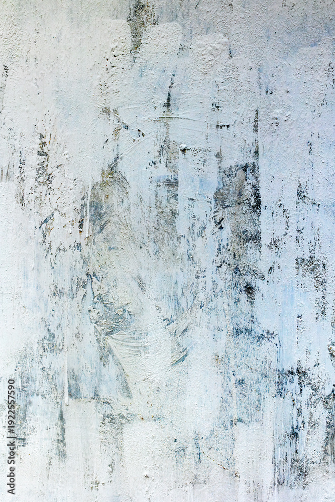 Fototapeta premium Abstract textured gray and white wall with brush strokes and weathered surface
