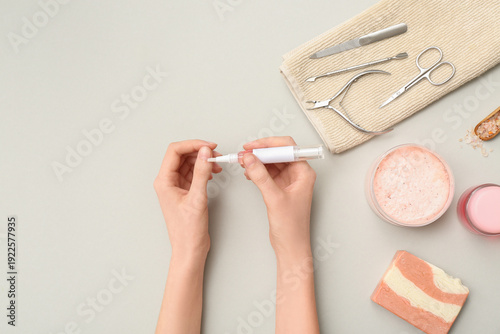 Female hands applying cutic...