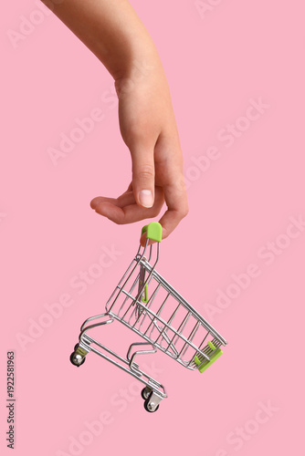 Female hand with green shop...