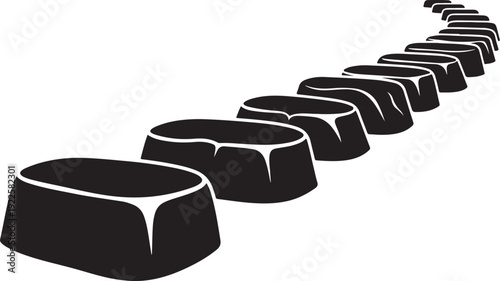 Black chocolate pieces in a diagonal line on white