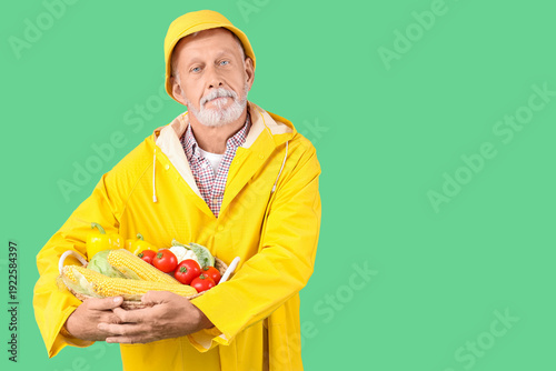 Mature male farmer with wic...