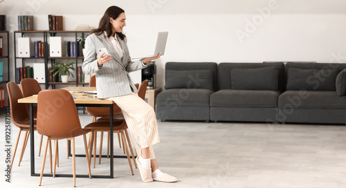 Young businesswoman working...