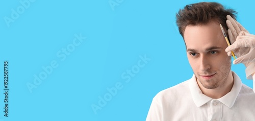 Young man with hair loss pr...