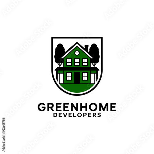 Green home developers logo with house and trees in shield