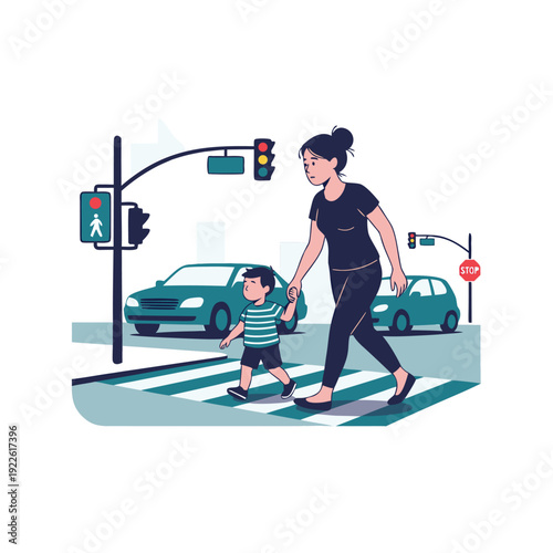 A mother and young son safely cross a city street at a crosswalk traffic lights visible