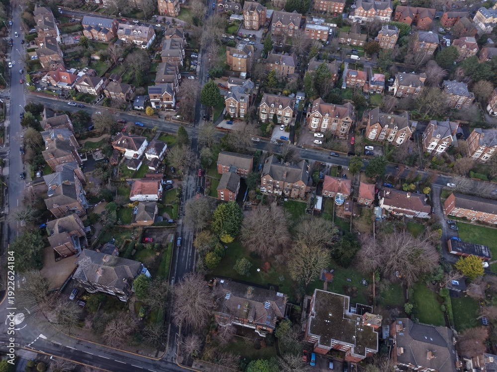 Fototapeta premium Aerial shot of Birkenhead’s suburban layout under clear, bright sunshine.