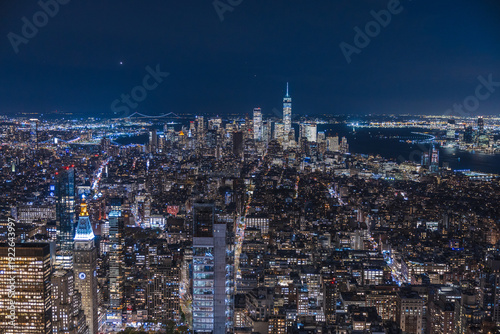 Obraz na płótnie Night aerial view of Manhattan skyline with illuminated skyscrapers and One Worl