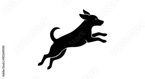 Black silhouette of a small dog jumping with joy and energy against a white background.