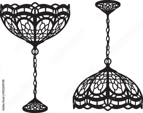 Two ornate black metal chandeliers isolated on transparent background