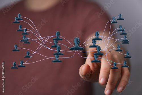 Hand touching a network dia...