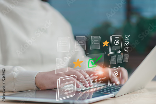 Customer feedback rating concept, business professional evaluating digital checklist on laptop in office, measuring service quality and performance approval through AI driven workflow system.