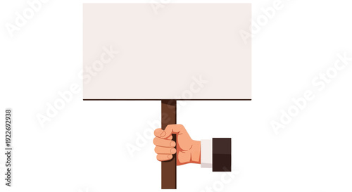 A hand holding a sign on a stick from a low viewpoint in a protest scene