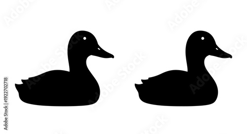Two black ducks silhouette vector illustration, minimalist waterfowl design Vector