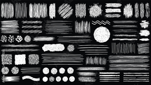 Collection of various white chalk scribbles, textures, and geometric shapes like circles and lines on a solid black chalkboard background.