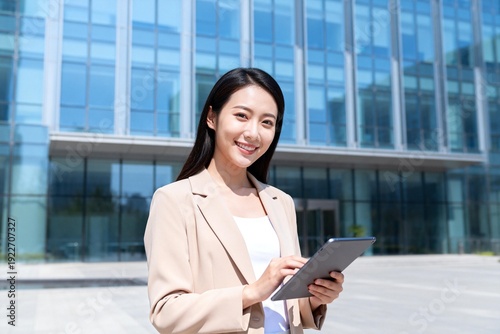 Wallpaper Mural Professional Businesswoman Using Digital Tablet Outdoors Torontodigital.ca