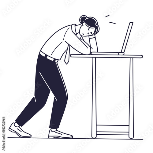 Man leaning on desk with head down in exhaustion