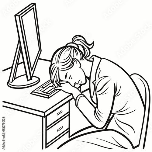 Woman resting her head on desk next to computer