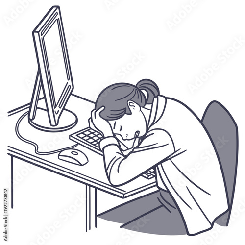 A woman sitting at a desk looking stressed