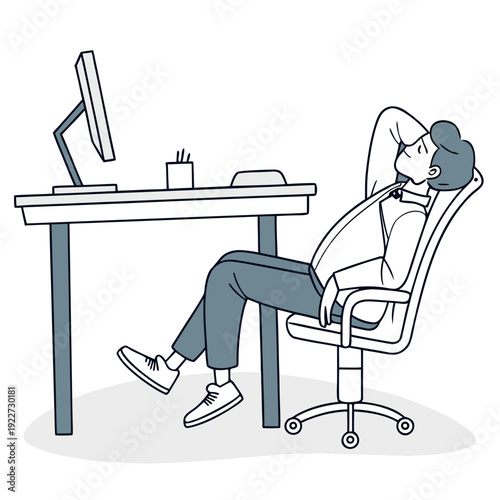 A man sitting at a desk with his head in his hand